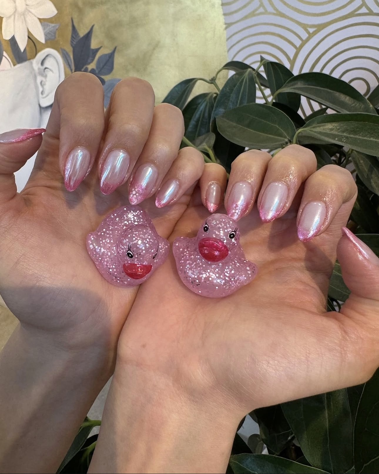Pink chrome aurora nails