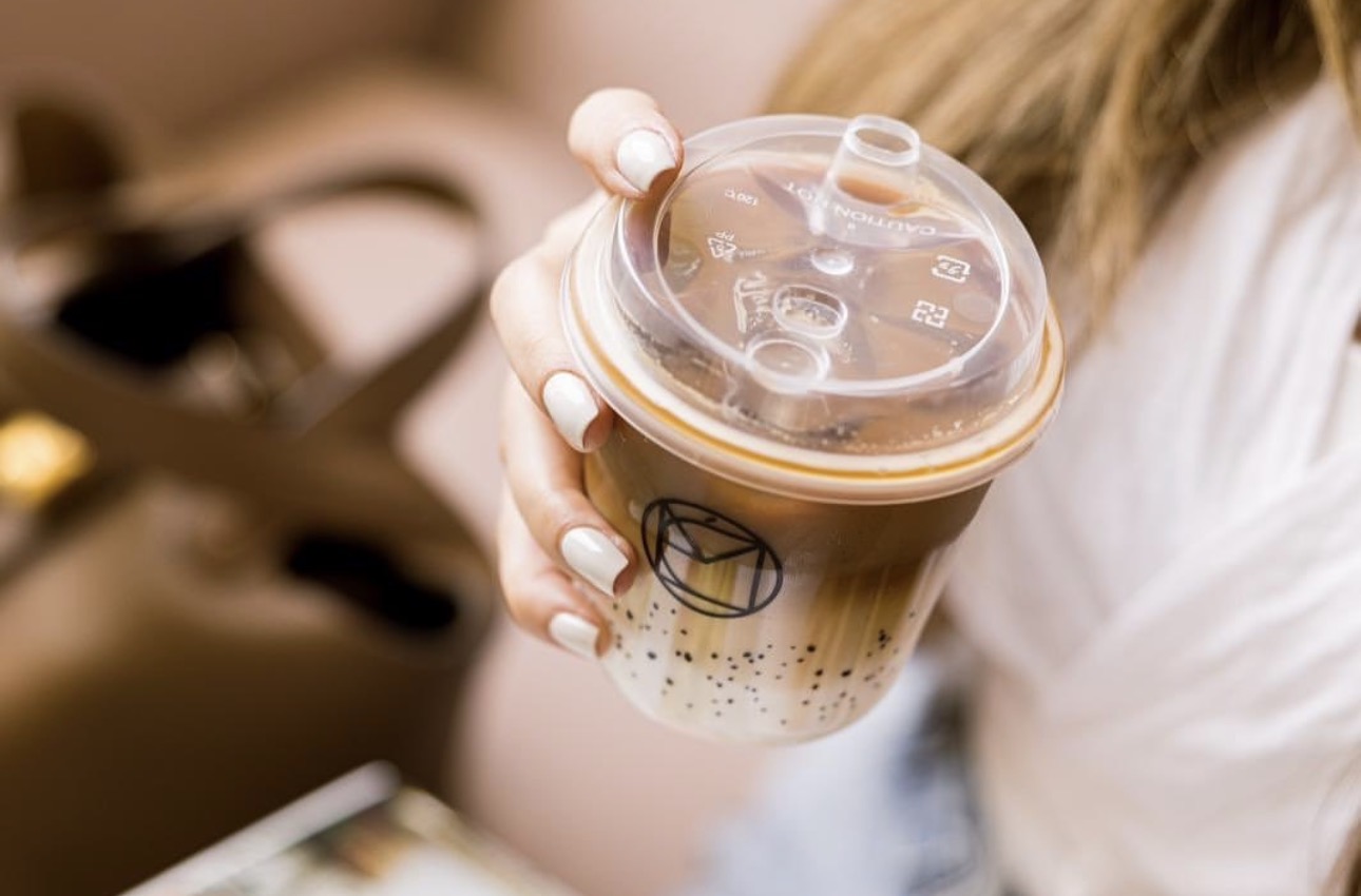 Close-up of Mélo branded iced coffee