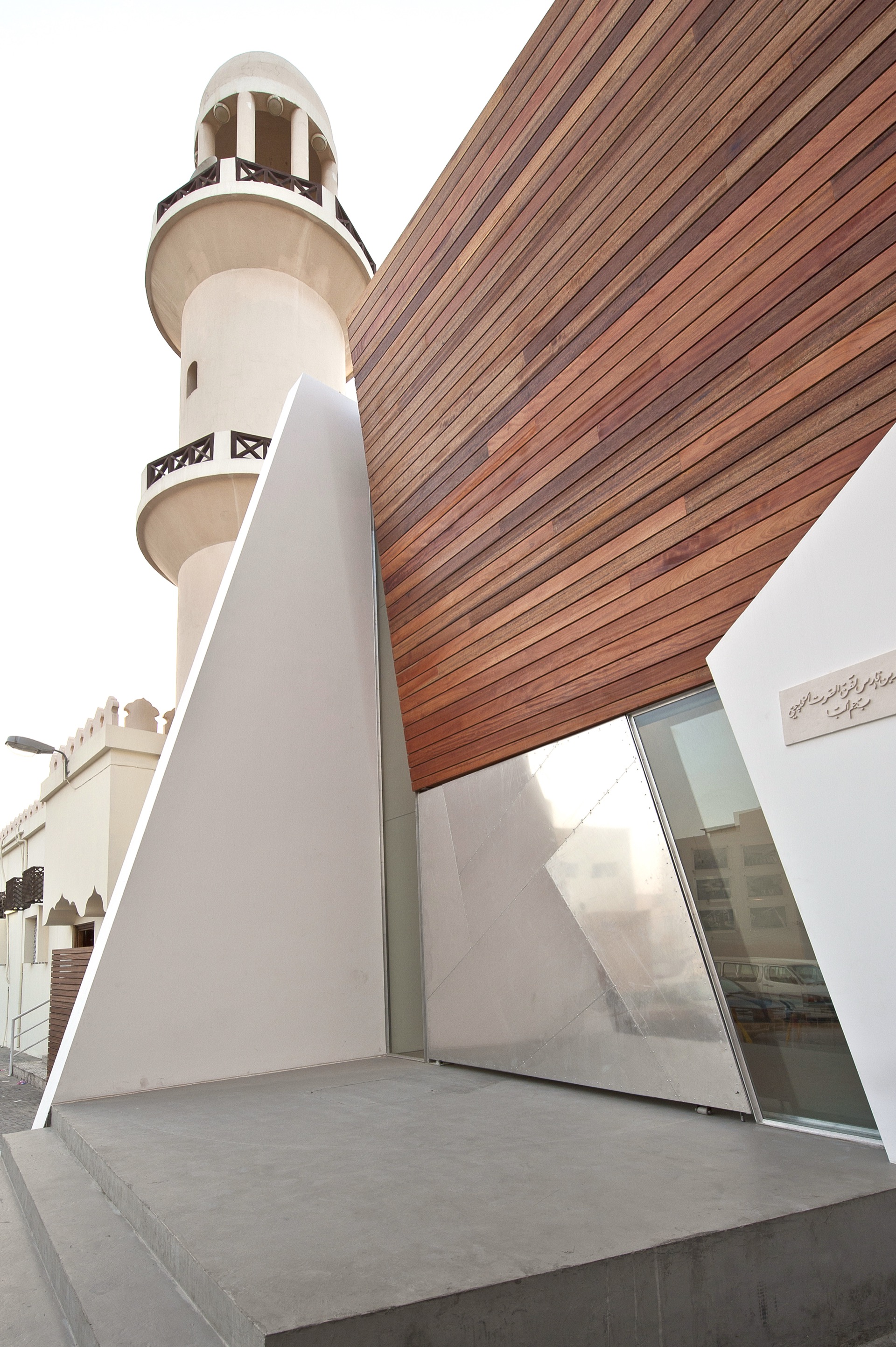 PAD project, angular building with mosque minaret